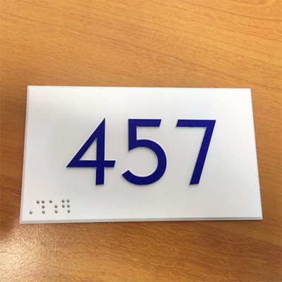 Interior number plate for relief and braille